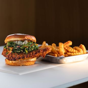 Twist Hot Chicken - THE NASHVILLE BLUES
fried chicken, bleu cheese, creamy Nashville sauce, kale slaw - Chicken Shop Near Me - Peoria, Arizona Twist Hot Chicken - THE NASHVILLE BLUES
fried chicken, bleu cheese, creamy Nashville sauce, kale slaw - Chicken Shop Near Me - Peoria, Arizona
