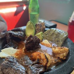 Vicky's Salvadorian Restaurant - The molecajete!!!!! This dish was soooooo damn good!!!! But be careful the stoneware was super hot!!!!