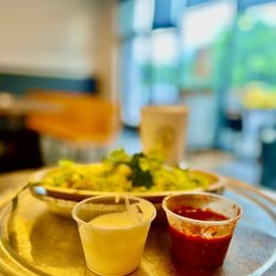 Barbacoa Burrito with chips and salsa, and chicken Al pastor. Happy taco Tuesday.