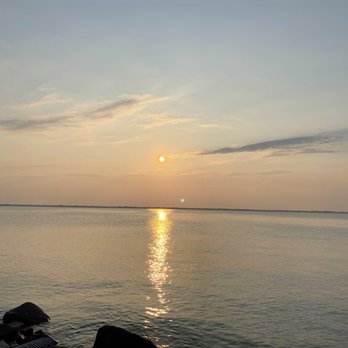 Sunset On the Water - the sun setting over the water - Steakhouses Near Me - Fond du Lac, Wisconsin Sunset On the Water - the sun setting over the water - Steakhouses Near Me - Fond du Lac, Wisconsin