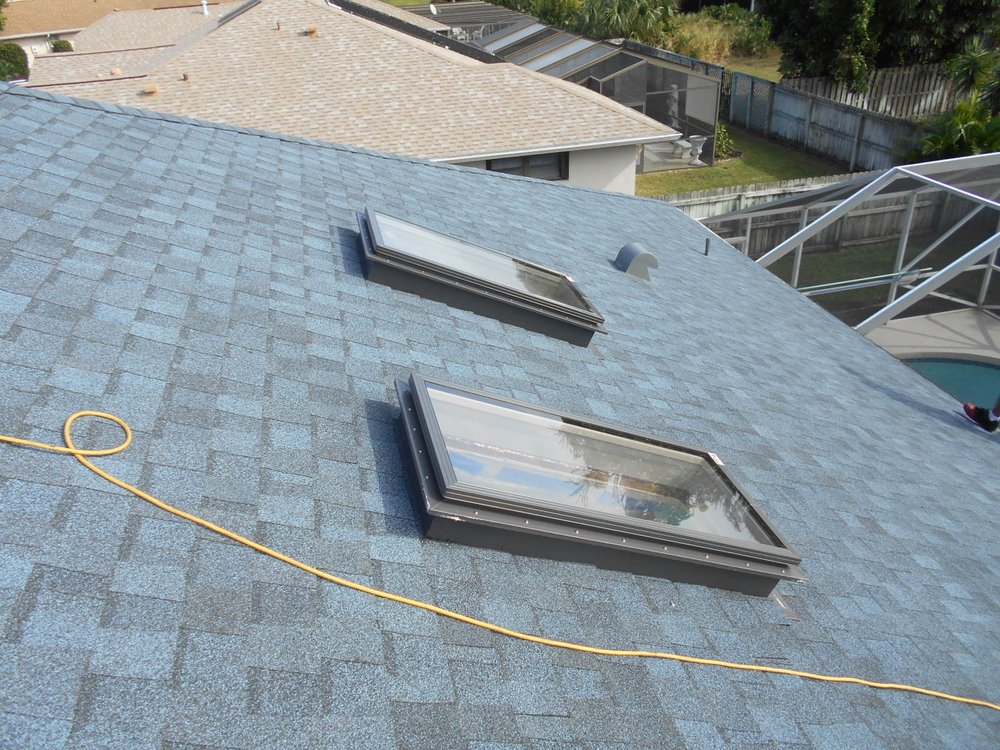 Slide of J K Behan Roofing