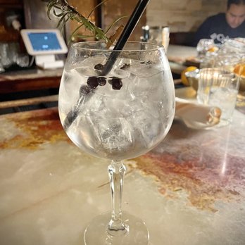 The Raconteur Bar & Kitchen - London (gin, tonic, juniper, charred rosemary) - Tapas Bars Near Me - Pleasantville, New York The Raconteur Bar & Kitchen - London (gin, tonic, juniper, charred rosemary) - Tapas Bars Near Me - Pleasantville, New York