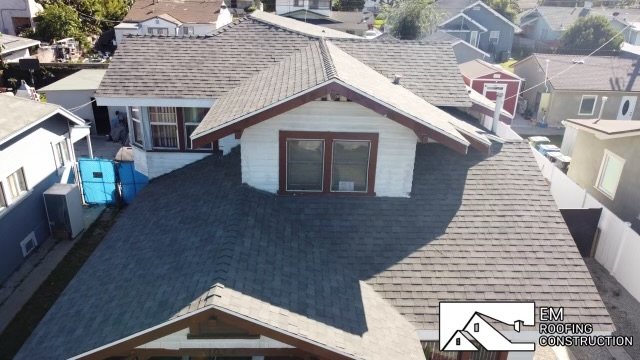 Slide of EM Roofing Construction