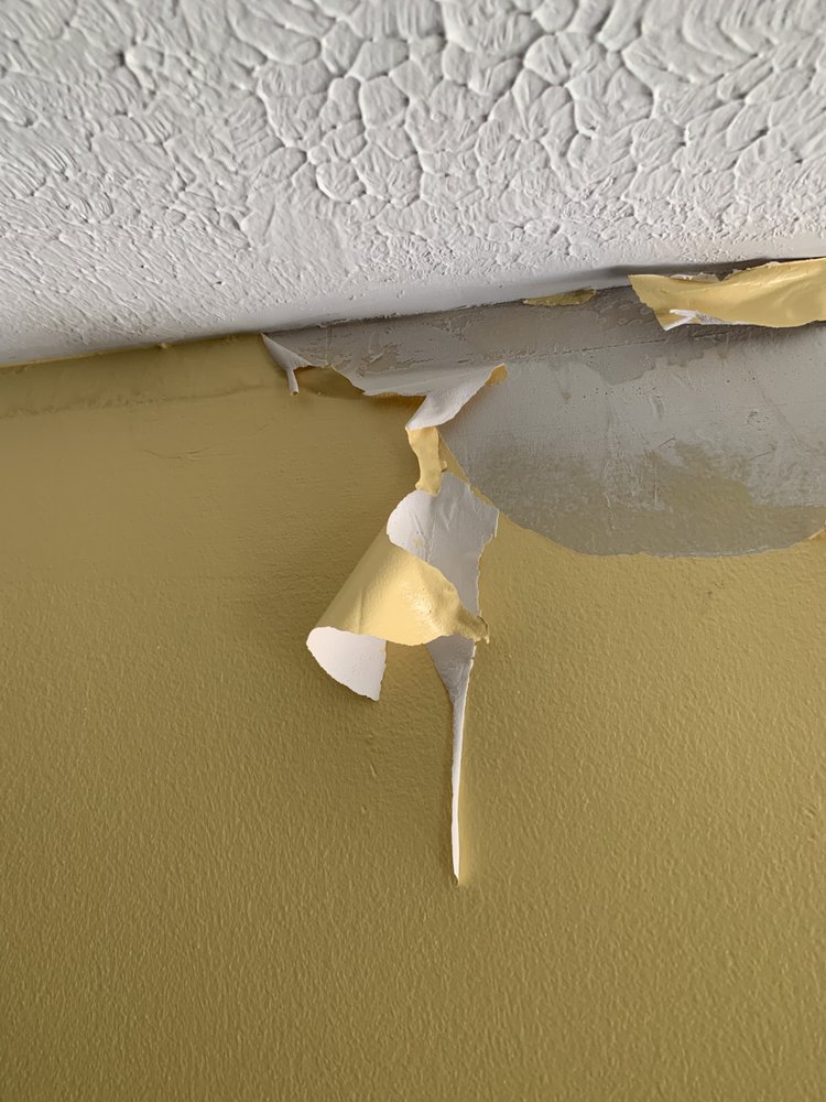 Slide of American Roofing Company