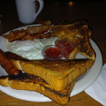 Russ' Restaurant - 2 eggs, 2 bacon, 2 sausage links, 2 slices of toast. - Diners Near Me - Grand Haven, Michigan Russ' Restaurant - 2 eggs, 2 bacon, 2 sausage links, 2 slices of toast. - Diners Near Me - Grand Haven, Michigan