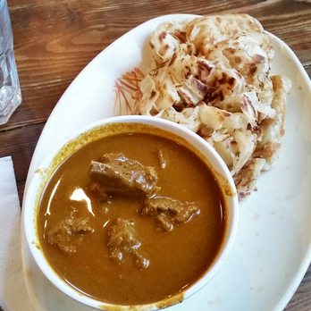 Roti King - The roti special with lamb curry - Indian Near Me - London, XGL Roti King - The roti special with lamb curry - Indian Near Me - London, XGL