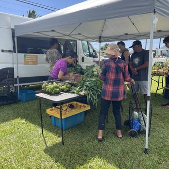 Grove Farm Market - A stand of fresh fruits and veggies - Farmers Market Near Me - Lihue, Hawaii