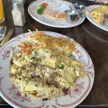 Eggstasy - Scrambled eggs with sun dried tomatoes, goat cheese and pine nuts and pancakes - Breakfast & Brunch Near Me - Phoenix, Arizona