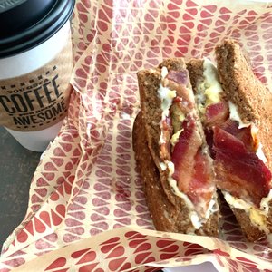 Photo of Mildred's - Kansas City, MO, United States. The standard breakfast sandwich on wheat and a mocha latte
