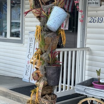 Corner Florist - Outside basket arch. Our feathered friends outside love their new homes. - Florists Near Me - Baltimore, Maryland Corner Florist - Outside basket arch. Our feathered friends outside love their new homes. - Florists Near Me - Baltimore, Maryland