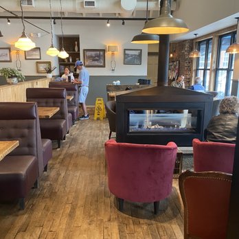Caffè Nero - people sitting at tables in a cafe - Cafes Near Me - Wellesley, Massachusetts