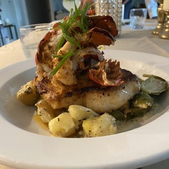 The Concierge By Chef Micahel - Main course of sea bass and lobster tail over potatoes and Brussels sprouts. - Personal Chefs Near Me