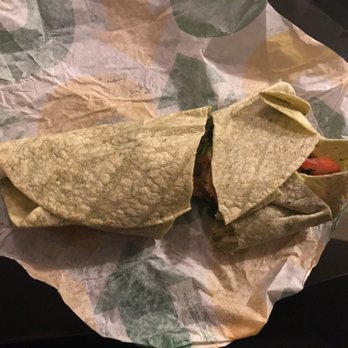 Subway - a burrito wrapped in paper on a table - Sandwiches Near Me - Whittier, California