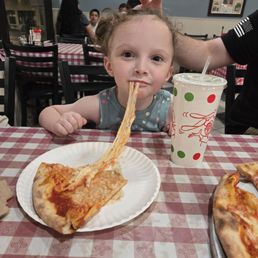 She's a fan of the cheese pizza. She's a fan of the cheese pizza.