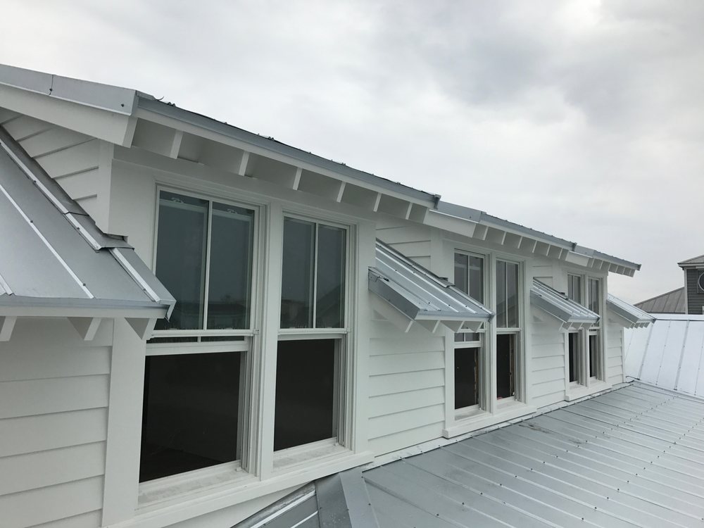 Slide of Canaan roofing and gutters