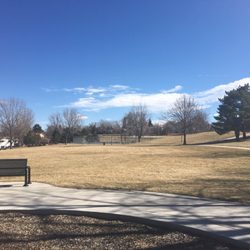 Club Crest Park North - Lots of grass and basketball courts in the distance.