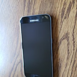 ZAGG Tyler Galleria - The protected phone lens when damaged ZAGG shield was removed