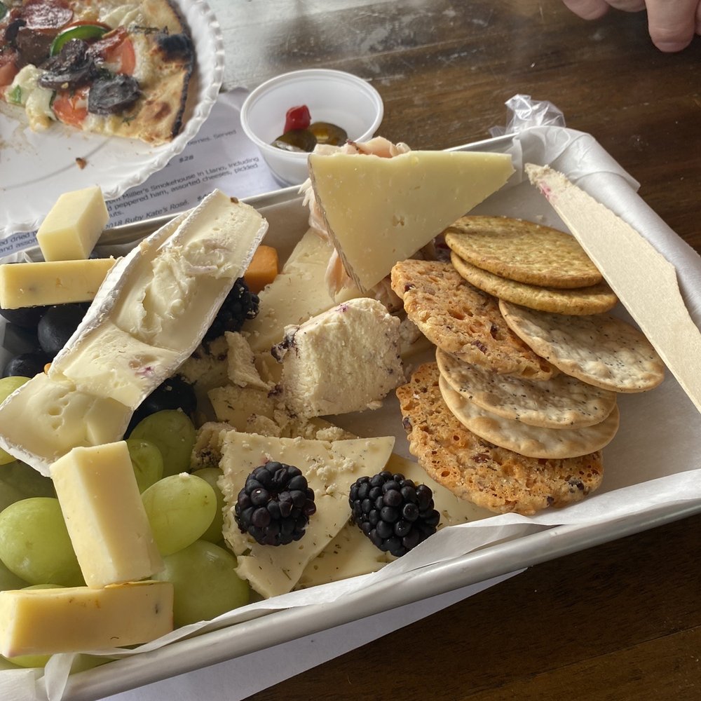 Torr Na Lochs - Cheese board and what was left of my pizza in the back... - Wineries Near Me - Burnet, Texas Torr Na Lochs - Cheese board and what was left of my pizza in the back... - Wineries Near Me - Burnet, Texas