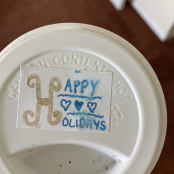 CALI COFFEE - a cup with a happy new year sticker on it - Coffee & Tea Near Me - Davie, Florida