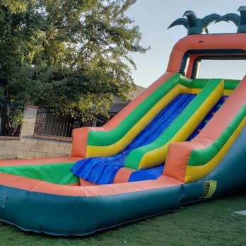 ABC Happy Bounce - 18ft tropical single lane waterslide - Party & Event Planning Near Me ABC Happy Bounce - 18ft tropical single lane waterslide - Party & Event Planning Near Me