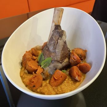 Valeria - Spice-rubbed braised lamb shank with cinnamon-spiced sweet potato puree and carrots - Pizza Near Me - Boerne, Texas Valeria - Spice-rubbed braised lamb shank with cinnamon-spiced sweet potato puree and carrots - Pizza Near Me - Boerne, Texas