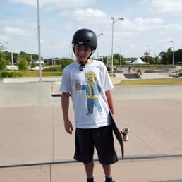 My son enjoying his day at the skate park. My son enjoying his day at the skate park.
