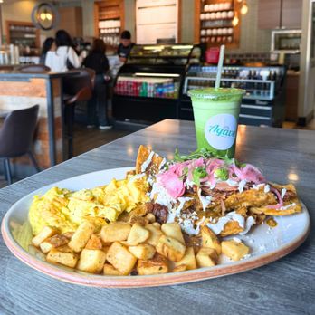 Agave Grill & Café - Signature chilaquiles loaded with pork, eggs, beans, and potatoes -- a hearty meal. - Cafes Near Me - Chula Vista, California Agave Grill & Café - Signature chilaquiles loaded with pork, eggs, beans, and potatoes -- a hearty meal. - Cafes Near Me - Chula Vista, California