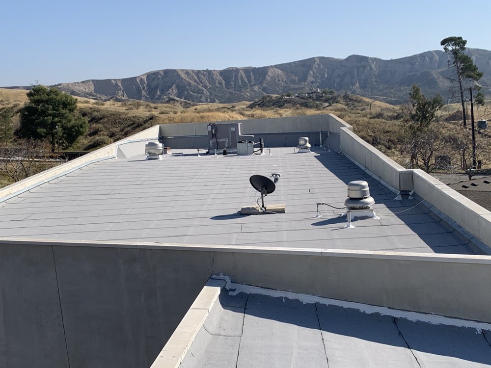 Slide of Espinal's Roofing & Waterproofing