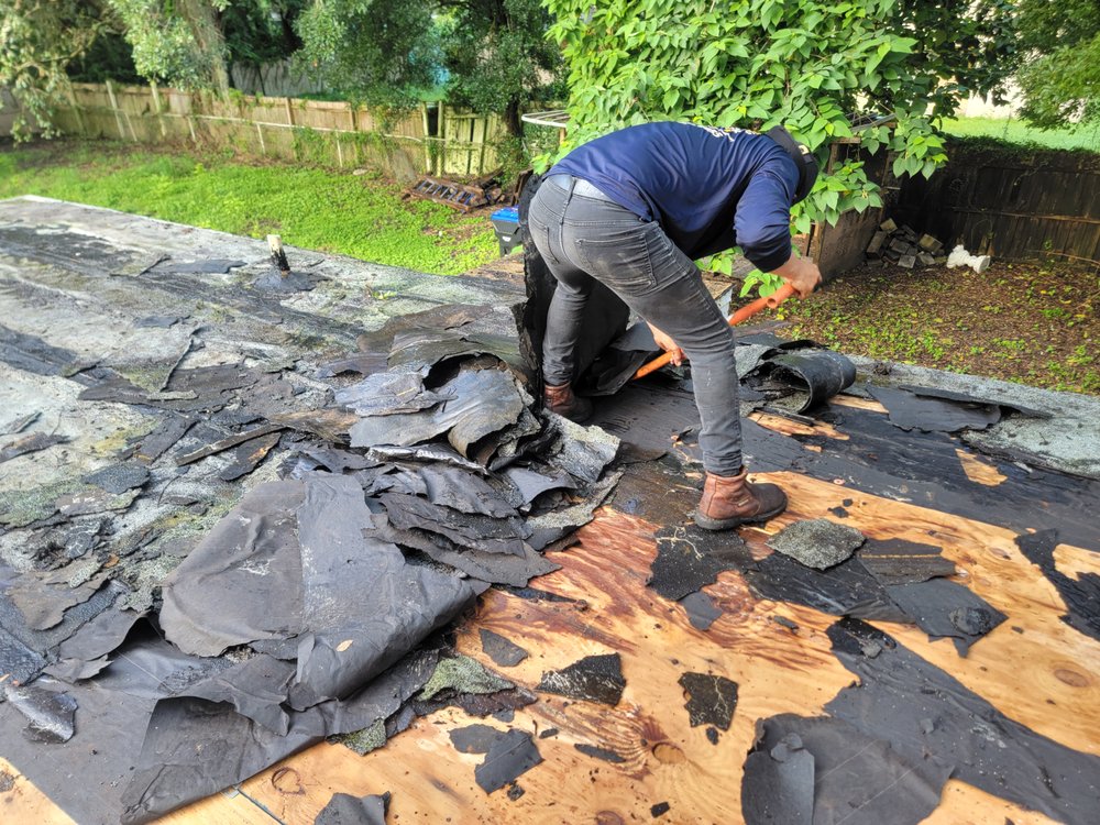 Slide of Roof Replacements & Repairs