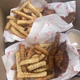 a box of fried chicken and fries a box of fried chicken and fries