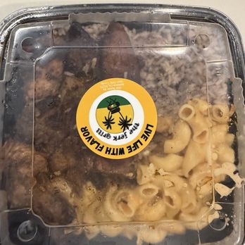 The Jerk Grill - Jerk chicken plate within the container - Caribbean Near Me - Redlands, California