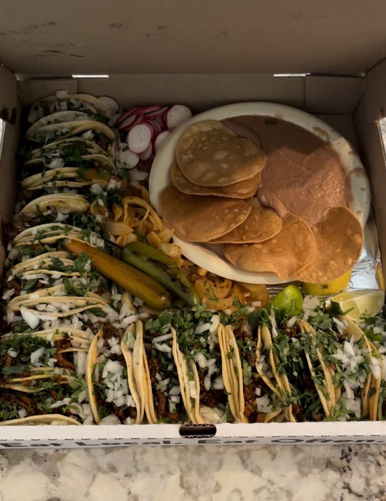 Tacos Los Troncos Logo