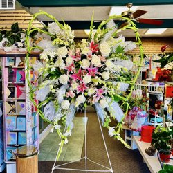 FITZHENRY-WIEFELS AND CREMATION AND BURIAL SERVICES - Angel wings leaving the florist to the viewing day 1