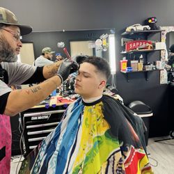 Back to life Barbershop - Ray cleaning up my son's eyebrows after his haircut.