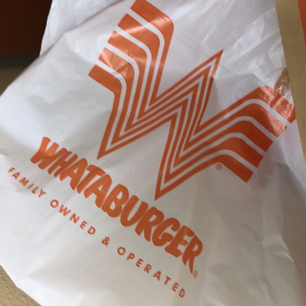 Whataburger - a white bag with a logo on it - Burgers Near Me - Amarillo, Texas Whataburger - a white bag with a logo on it - Burgers Near Me - Amarillo, Texas