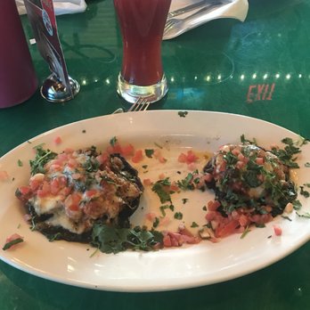 Oregano's - This was their stuffed shroom looks like some one ate what was supposed to be in between them. - Pizza Near Me - Tucson, Arizona Oregano's - This was their stuffed shroom looks like some one ate what was supposed to be in between them. - Pizza Near Me - Tucson, Arizona