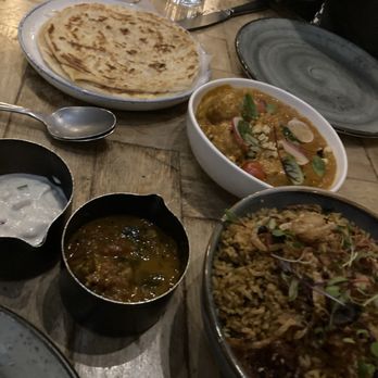 Ettan - Biryani in front with eggplant and Arita. Corn kefta in back - Indian Near Me - Palo Alto, California