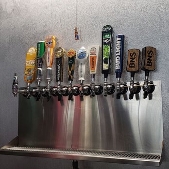 El Coqui - a row of beer taps - Dive Bars Near Me - San Diego, California El Coqui - a row of beer taps - Dive Bars Near Me - San Diego, California