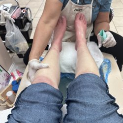 Ec Nail and Spa - This is a picture of my feet being burned by callus remover.