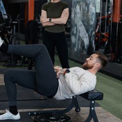 Chase Mansmann Personal Training - demonstrating a single leg hip thrust with proper core control