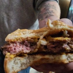 McDonald's - Undercooked burger from McDonald's drive through.