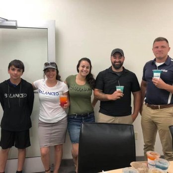 Balanced Nutrition - a group of people posing for a picture - Juice Bars & Smoothies Near Me - Watertown, New York