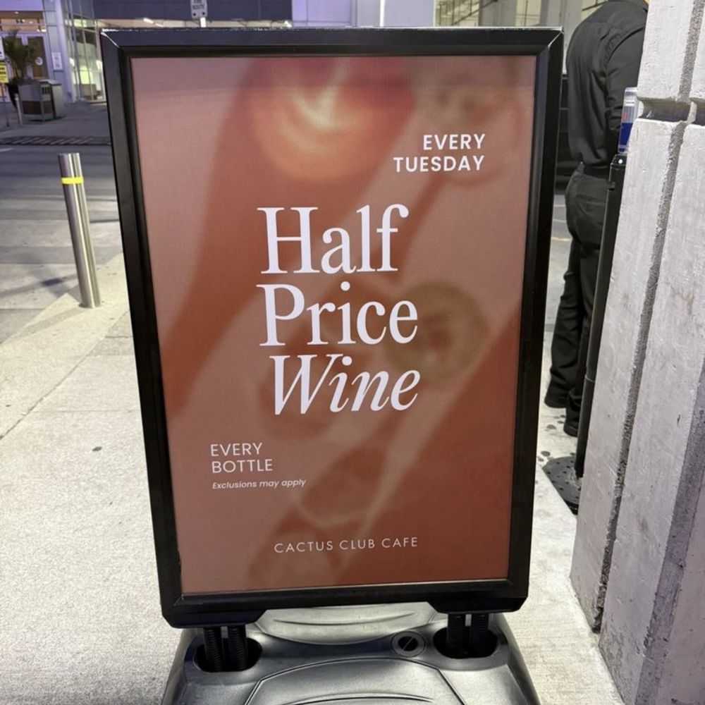 Cactus Club Cafe - Half price sign for wine bottles - Cocktail Bars Near Me - Ottawa, Ontario