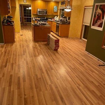 DW Home Improvement - a wood floor in a kitchen - General Contractors Near Me DW Home Improvement - a wood floor in a kitchen - General Contractors Near Me