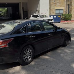 the white car is going out the entrance lane which the dark car doesn't see until the last moment due to a blind curve, occurs daily the white car is going out the entrance lane which the dark car doesn't see until the last moment due to a blind curve, occurs daily