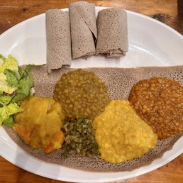 The food here is delicious, and the owners and staff are great. I order the veggie platter, and recommend trying the sambussa as well.