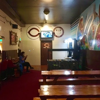The Cove Lounge - Inside facing foosball table & darts - Dive Bars Near Me - Chicago, Illinois