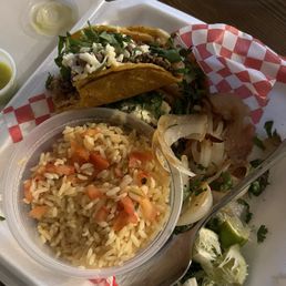 Street tacos with a side of Mexican rice