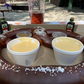 Oktoberfest Milwaukee - 1 giant pretzel with cheese and mustard sauces. (plus 2 shots of Jeiger) - Lounges Near Me - Glendale, Wisconsin Oktoberfest Milwaukee - 1 giant pretzel with cheese and mustard sauces. (plus 2 shots of Jeiger) - Lounges Near Me - Glendale, Wisconsin
