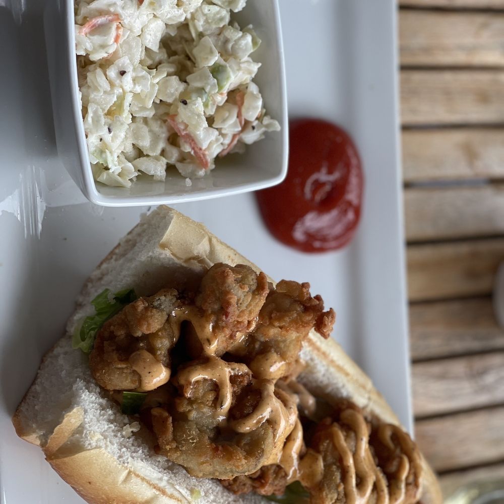Surfside Rooftop Grill - Fried oyster Po' Boy with coleslaw - New American Near Me - Stone Harbor, New Jersey Surfside Rooftop Grill - Fried oyster Po' Boy with coleslaw - New American Near Me - Stone Harbor, New Jersey